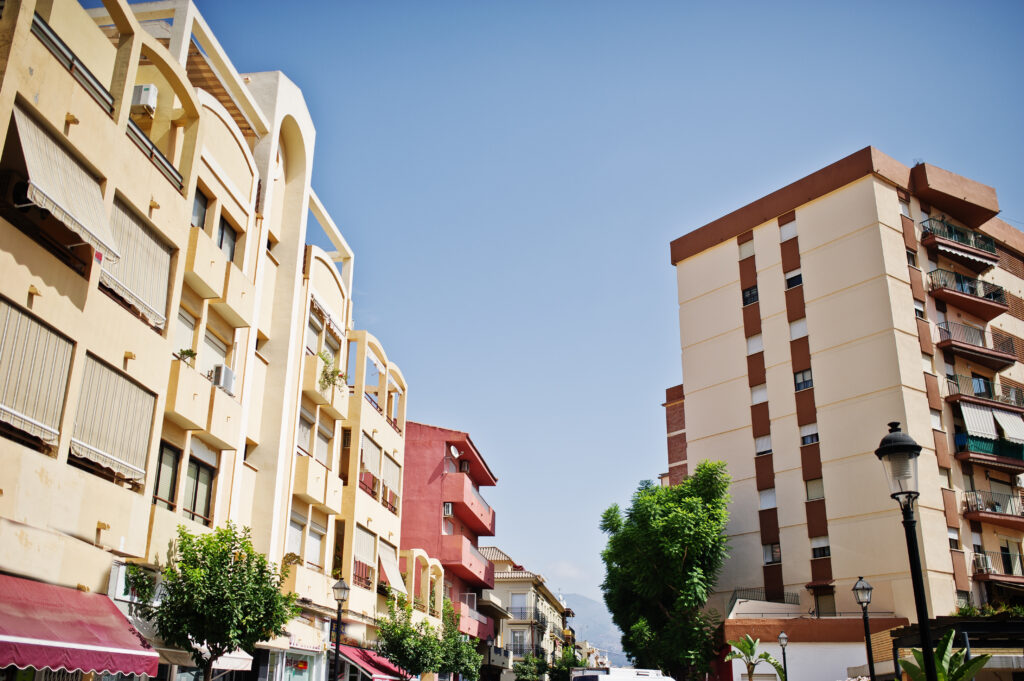 streets with architecture of the resort town buildings and tropi